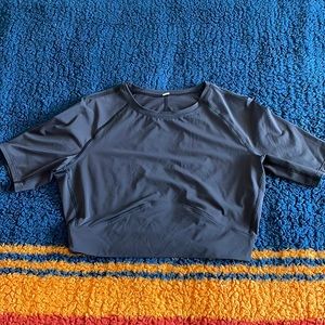Lululemon crop top yoga shirt with opening in the back
